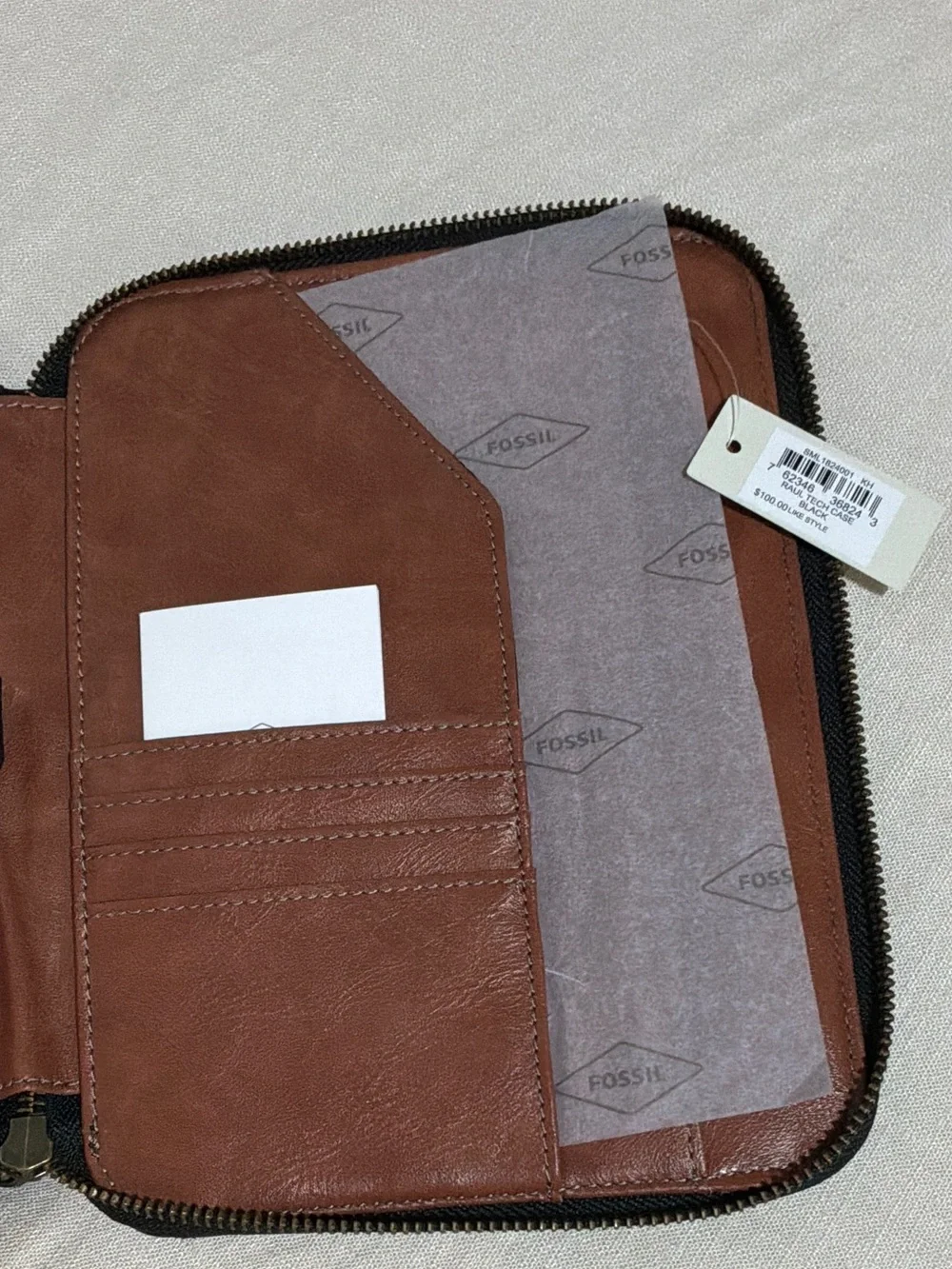 Fossil mini ipad Leather case and Organizer Wallet